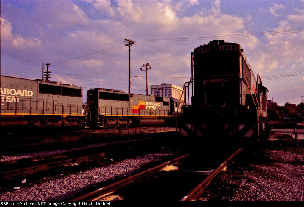 SBD 1606 in the foreground as a trio of SD50's passes by